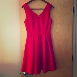 Cute, flowy red dress! Worn once to a wedding.